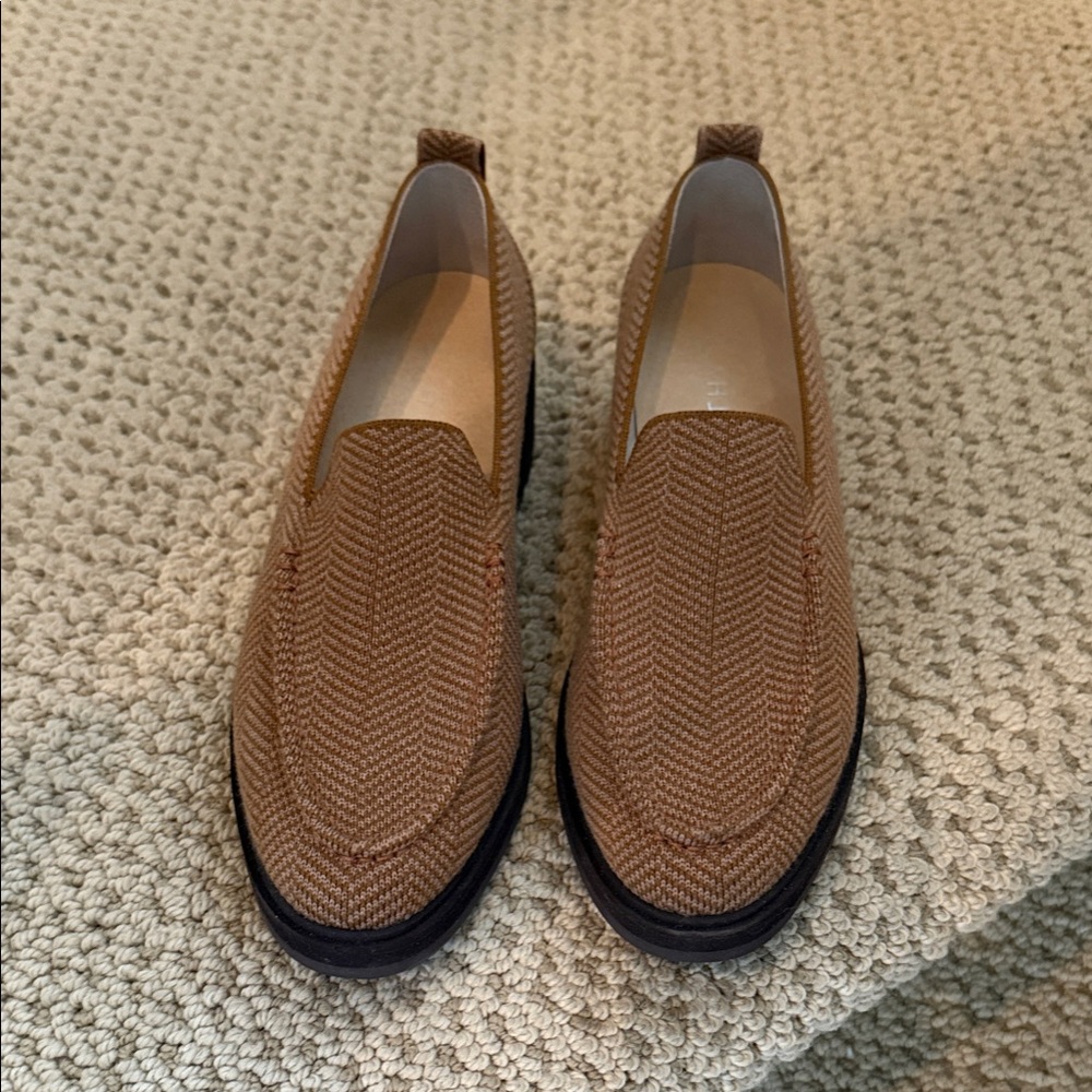 Brown loafers with dark brown soles